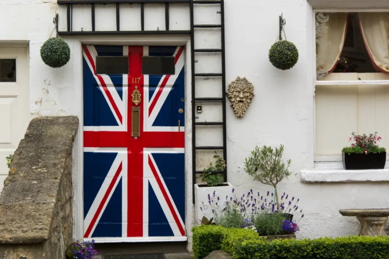 A house with a door painted like to Union Jack to represent settlement through 10 years' Indefinite Leave to Remain
