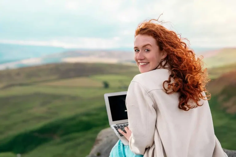 Woman doing remote work in the UK on a Visitor Visa.