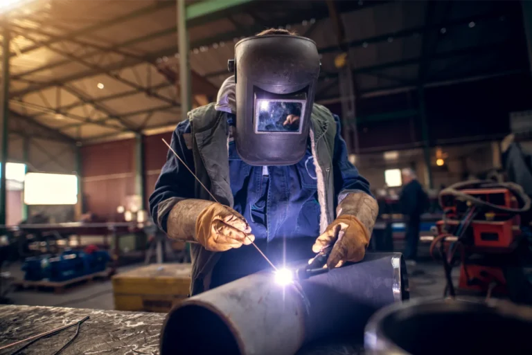 Welder working in the UK after their job was added to the Immigration Salary List.