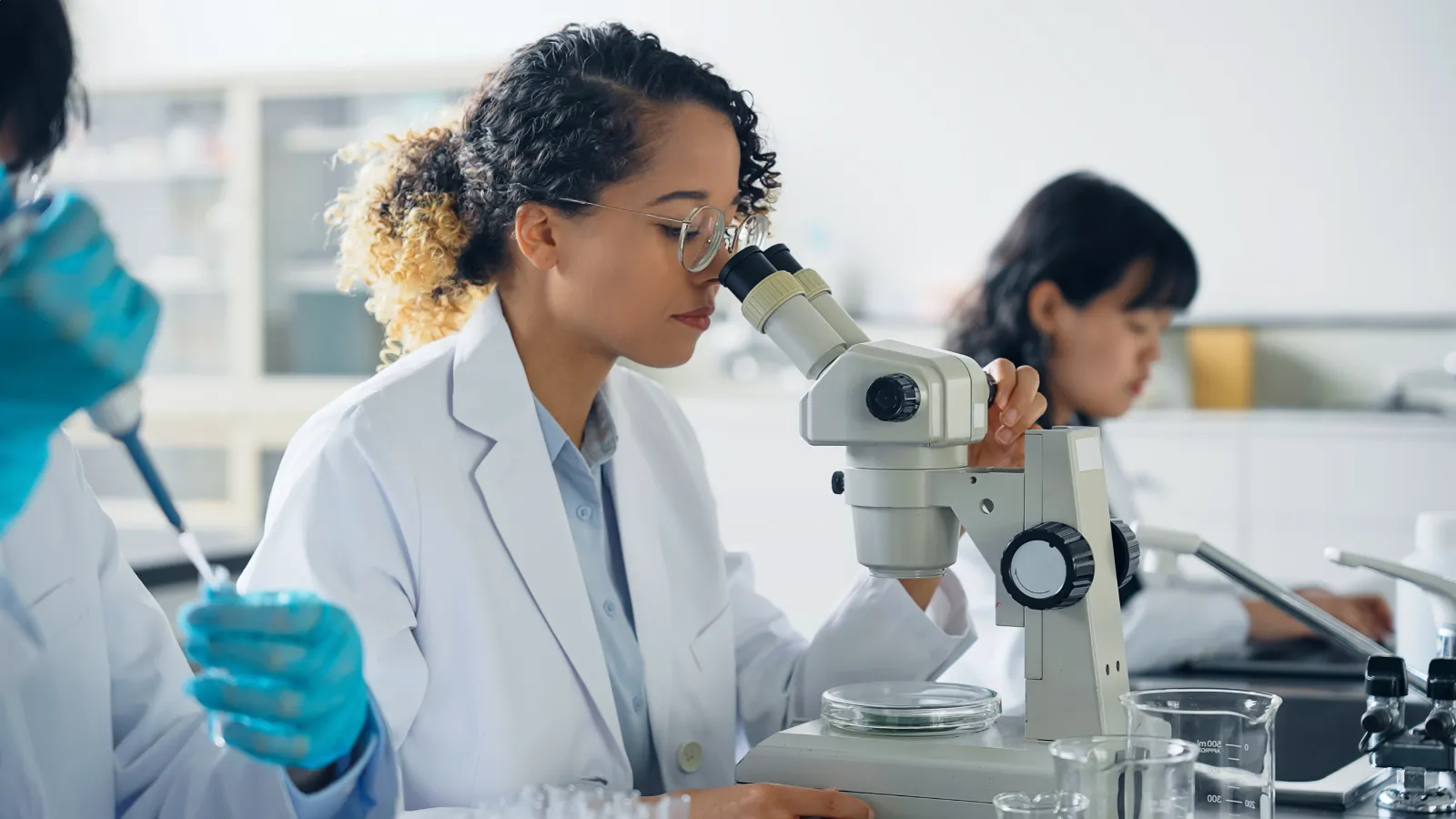 Chemical scientists doing working in the UK on a Skilled Worker Visa due to their job being on the new Immigration Salary List.