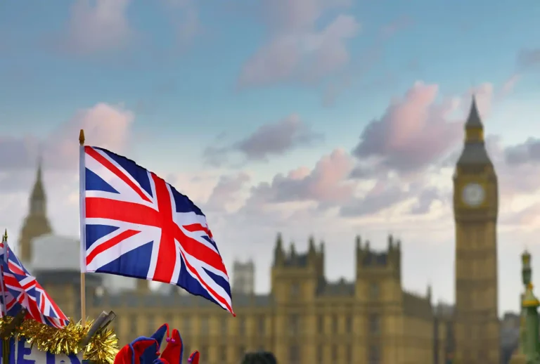 British flag and Westminster representing the government, who introduced new rules for Student Visas and immigration