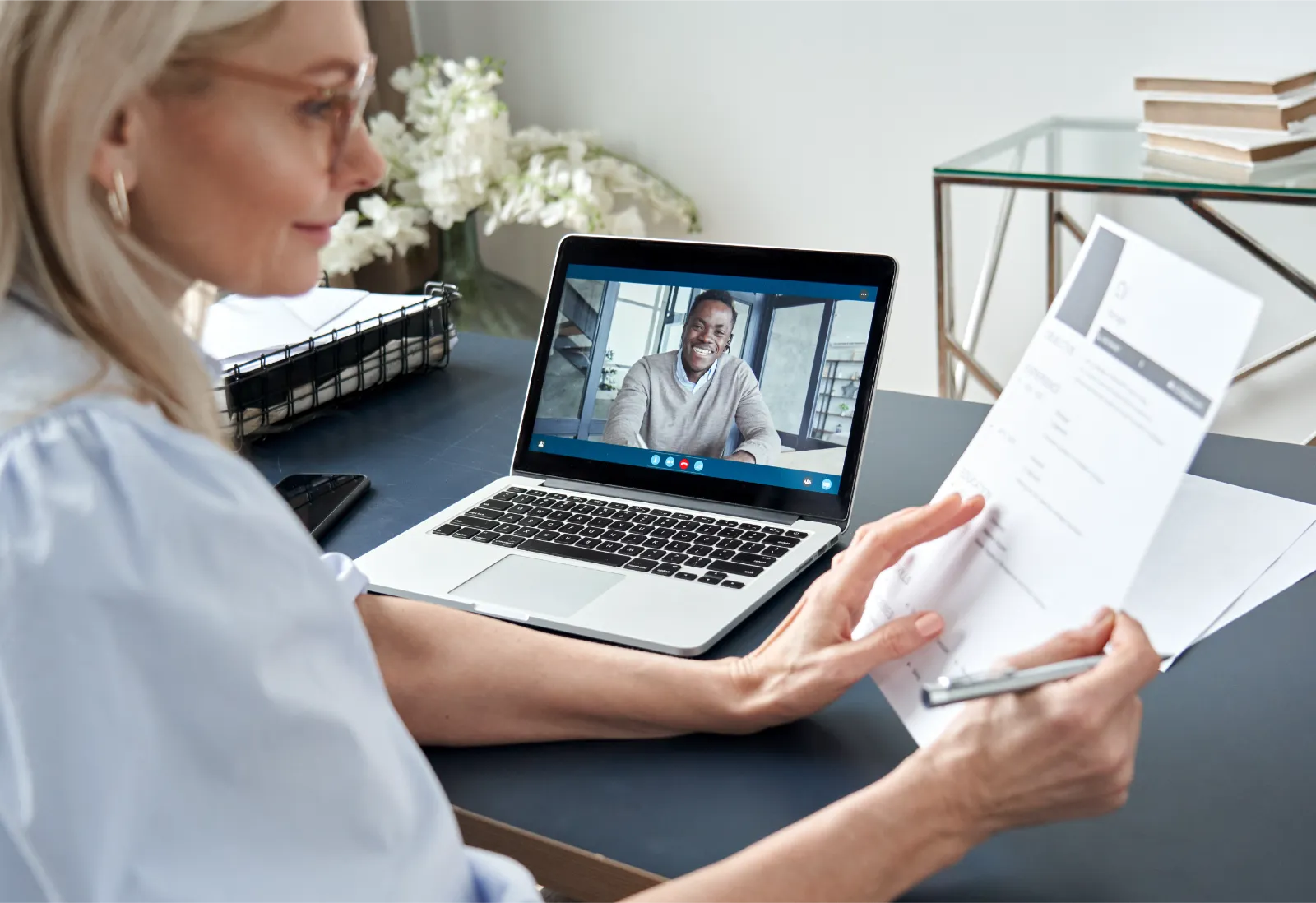 Woman undertaking a Skilled Worker Visa interview.